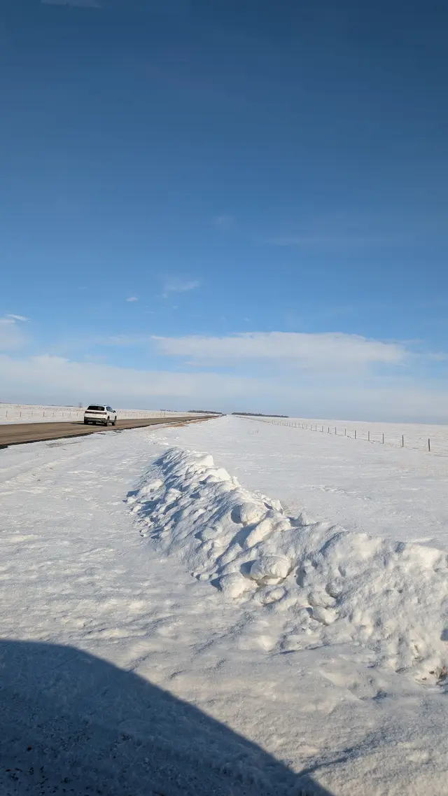 Highway 15 through snowy prairie